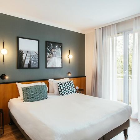 Aparthotel Adagio La Defense Le Parc Курбевуа Экстерьер фото
