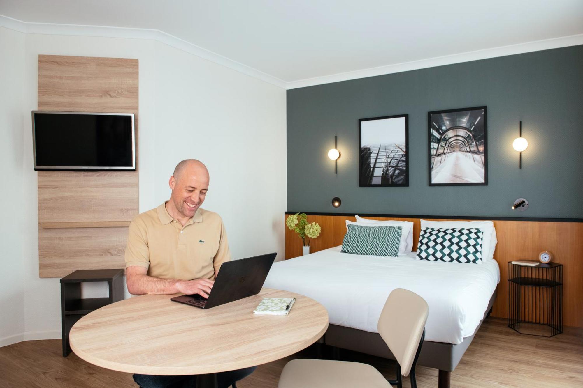 Aparthotel Adagio La Defense Le Parc Курбевуа Экстерьер фото